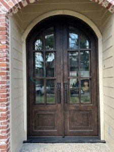 Beautiful front entry door on red brick house.